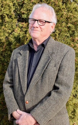 Portrait of Tim Haley, Associate.